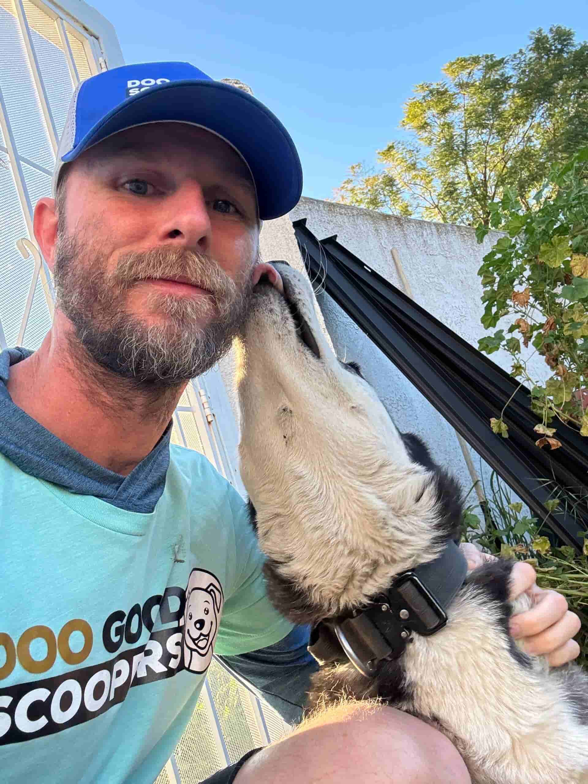 DooGoodScoopers technician at a customer's gate